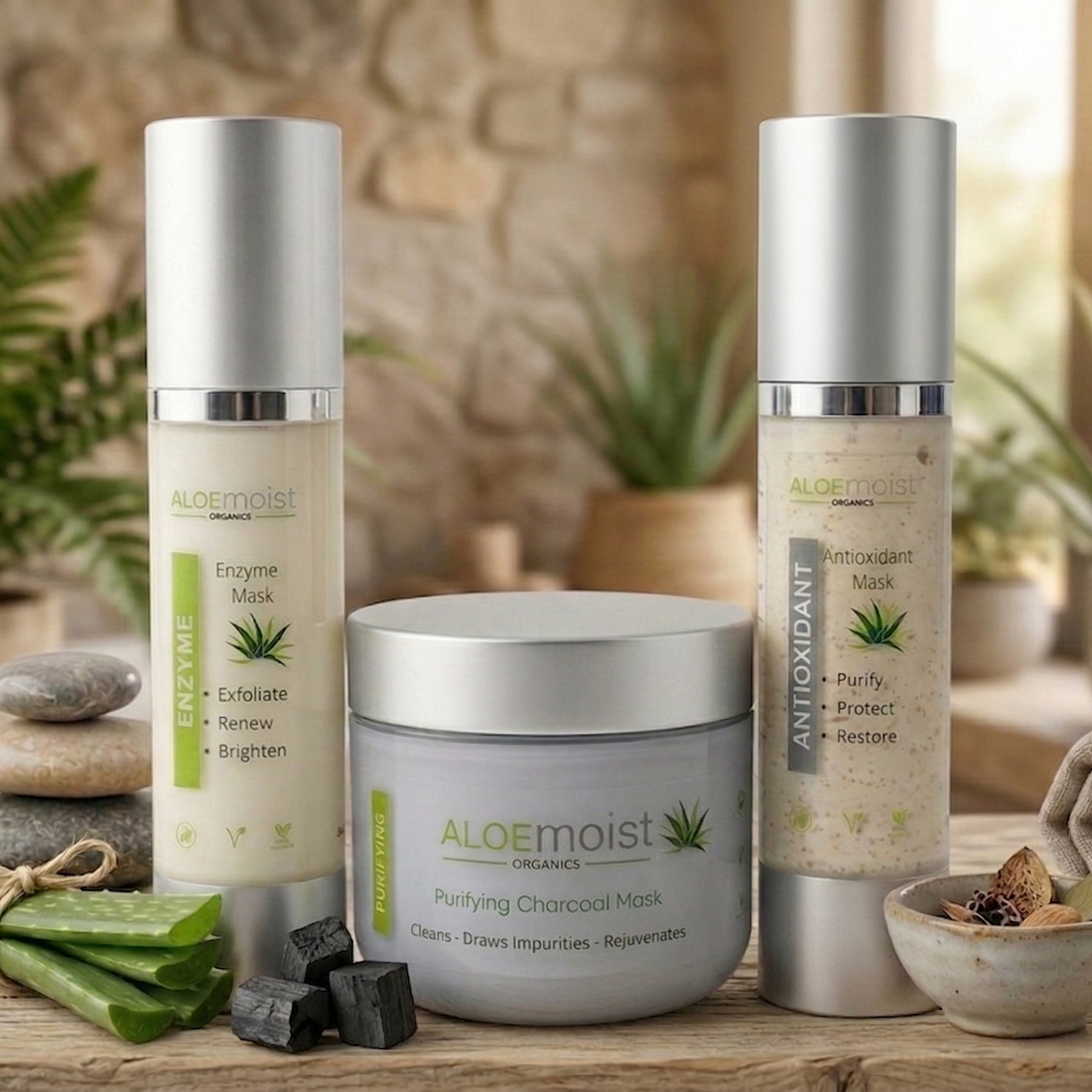 Three Aloe Moist skincare products on a white background